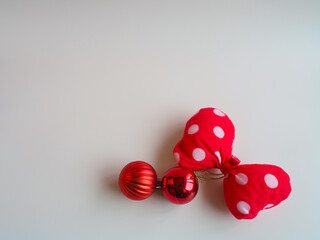 Cute red polka dot bow for birthday or valentine minimal background.