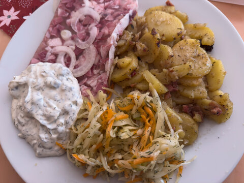 german Pork brawn with fried potatoes and remulade sauce