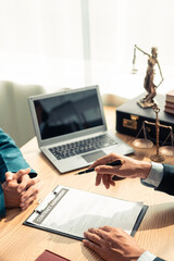 Concept of justice and law Legal courtroom Lawyers discuss contracts or business agreements at a...