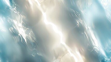 A shimmering abstract background with soft light and fluid patterns.