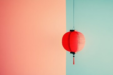 Obraz premium A minimalist shot of a single red lantern hanging against a pastel-colored wall. picture