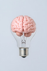 Human brain inside a light bulb representing the power of thinking