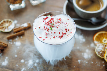 Strawberry granita with prosecco foam. Delicious sweet dessert food closeup served for lunch in modern gourmet cuisine restaurant