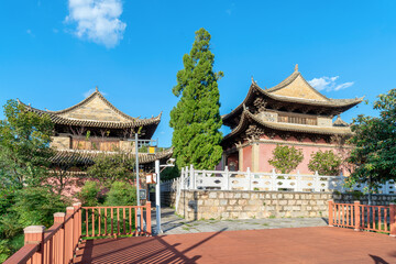 Ancient buildings on the shore of Yilóng Lake in Shiping County, Yunnan, China.