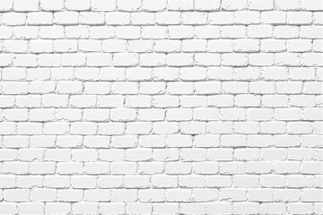 Obraz premium White brick wall background with a textured surface in a clean and minimalistic style.