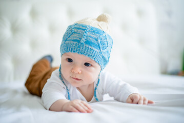 portrait of newborn baby boy dressed