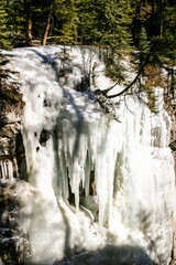 A waterfall with ice on it