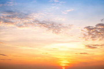 Sky,sunset, beautiful , luxury soft gradient orange gold clouds and sunlight on the blue sky perfect for the background, Sunrise on morning or everning in winter warm time ,Twilight summer,silhouette