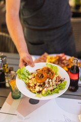 Delicious Salad with Onion Rings Served on a Plate
