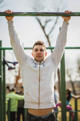 Fototapeta premium Man Performing Pull-Up