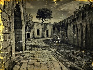 An old, abandoned, decrepit houses black and white vintage photo