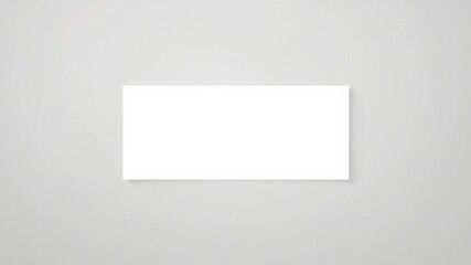 Fototapeta premium Blank rectangular card on a light grey background, ideal for design presentation and mockup purposes.
