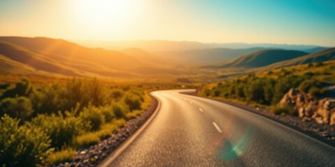 Obraz premium Serene Sunset Drive on a Winding Asphalt Road Through Rolling Hills