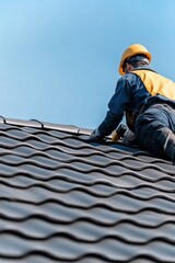 A construction worker is installing a new roof using proper tools. The scene captures the precision and skill involved in roofing work.