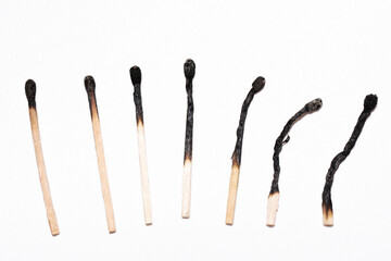 Burnt Matches in Sequence on White Background