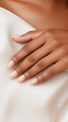 Fototapeta premium A gentle touch of a hand gripping an arm, showcasing serene skin textures in soft natural light