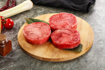 Delicous raw tuna medallion for cooking