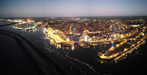 Fototapeta premium Aerial view of the city of Harlingen during sunset, The Netherlands