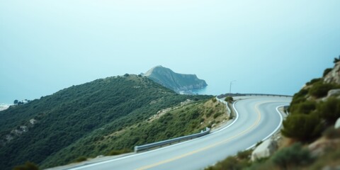 Coastal Highway Winding Through Verdant Hills and Ocean Views