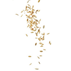 Raw sunflower seeds falling gracefully against a white backdrop