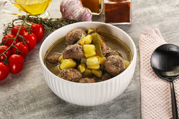 Soup with meatball and potato
