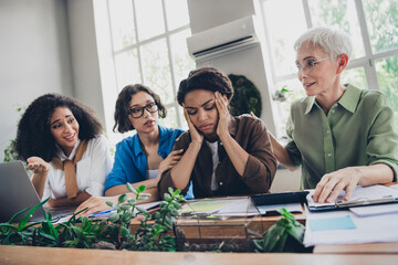 Naklejka premium Photo of corporate four colleagues women community upset teammate leadership meeting coworking successful light office