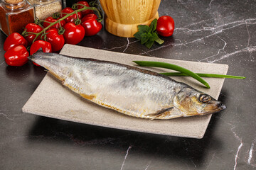 Whole raw salted herring fish