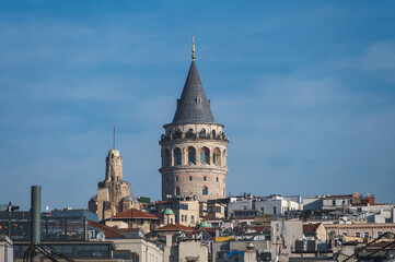 Obraz premium View of the Galata Tower, Beyoglu district, Istanbul, Turkey. 14th-century city landmark.