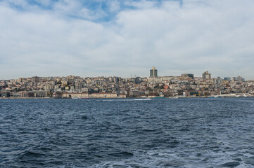Panorama on the shore of the Bosphorus near Kabatash pier on a sunny day