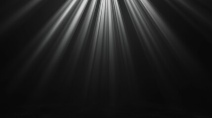 Obraz premium Black and white photograph of a group of rays of light shining down on a dark background. the rays are arranged in a diagonal pattern, creating a sense of depth and dimension.