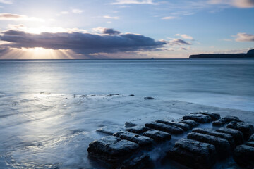 Sunrise at Tessellated pavement in Tasmania, Eaglehawk Neck. Tasman Peninsula. natural wonders.
