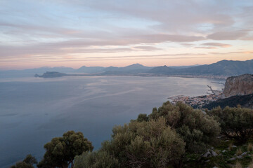 Dramatic sunset views from Monte Pellegrino's Belvedere in Palermo, capturing the rugged...