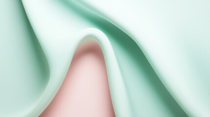Abstract mint green fabric folds on pink background.
