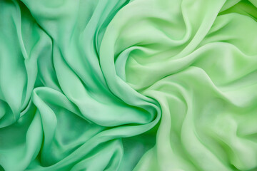 Obraz premium Luxury Green silk fabric texture, satin wave textile background