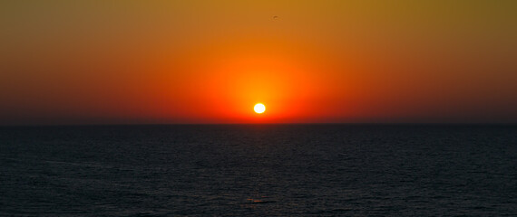 Sea and bright sunset. Concept - vacation and travel.