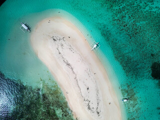Aerial view ofnaked island in Siargao, Philippines, with a coral reef. High quality photo