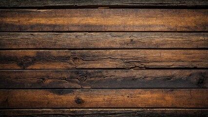 Fototapeta premium A close-up view of a dark table made of wood planks arranged horizontally. The surface of the table is aged and textured, with natural wood grain patterns. Grunge wooden background.