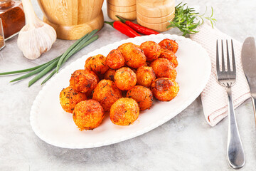 Baked young potato with paprika