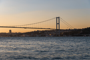 Beautiful view of the Bosphorus and the Bosphorus Bridge in the background at sunset.