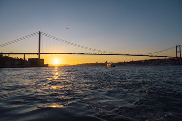 Obraz premium Beautiful view of the Bosphorus and the Bosphorus Bridge in the background at sunset.