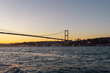 Obraz premium Beautiful view of the Bosphorus and the Bosphorus Bridge in the background at sunset.