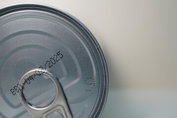 Closeup image of canned food with best before date