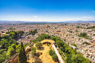 Granada town in Spain from the Alhambra complex. Panoramic view of a city from an elevated vantage...