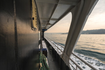Amazing view of the Bosphorus from the deck of a ferry at sunset, Istanbul, Turkey.