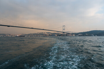 Obraz premium Beautiful view of the Bosphorus and the Bosphorus Bridge in the background at sunset.