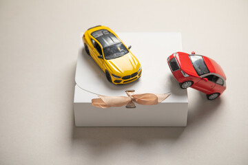 Gift box with a toy car. Present