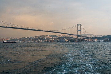 Beautiful view of the Bosphorus and the Bosphorus Bridge in the background at sunset.