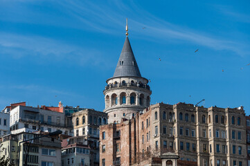 View of the Galata Tower from Eminonu district, Beyoglu district, Istanbul, Turkey. Bosphorus, Galata bridge, sunny day