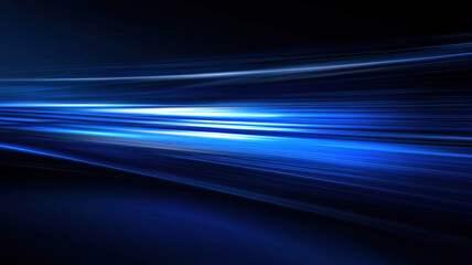 Abstract blue light streaks motion blur with futuristic speed effect on dark background.