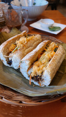 Two banh mi sandwiches which is one of the most iconic authentic local traditional Vietnamese food